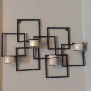 Metal wall mounted candle holder